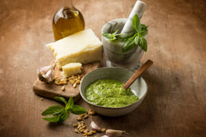 bowl with traditional italian pesto and ingredients